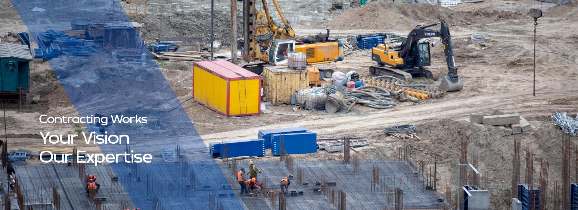 Construction site with workers and heavy machinery