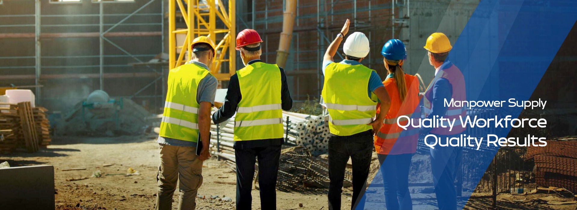 Construction site with workers and heavy machinery